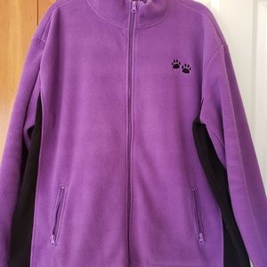 Women 's Fleece Zippered Jacket with paw print logo.
